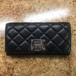 Black Michael Kors stitched wallet